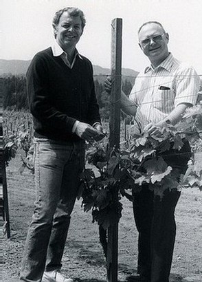 Black and white image of Bill Malkmus and Winemaker Bill Fuller standing in the vines